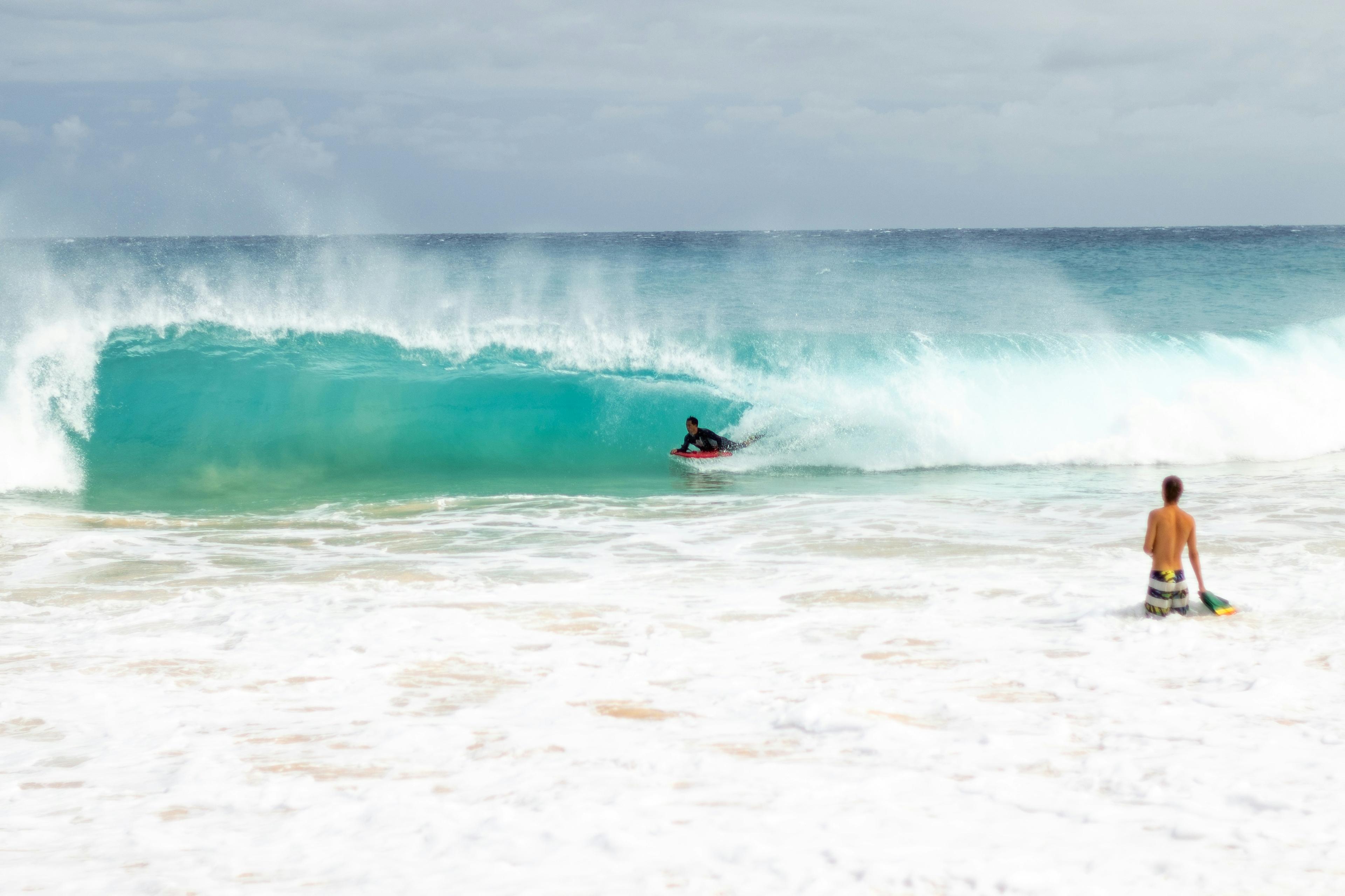 The Wedge Newport Beach with massive shore break waves and bodyboarders