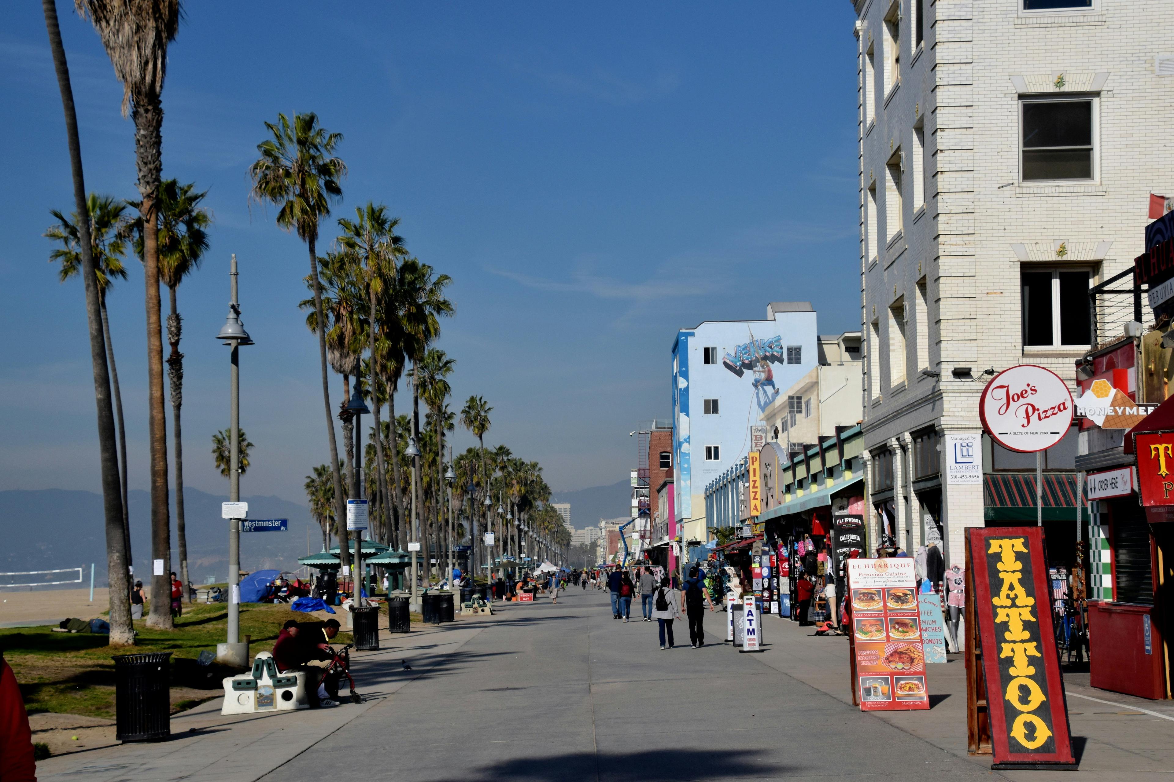 Balboa Peninsula beach with Newport Beach boardwalk and ocean