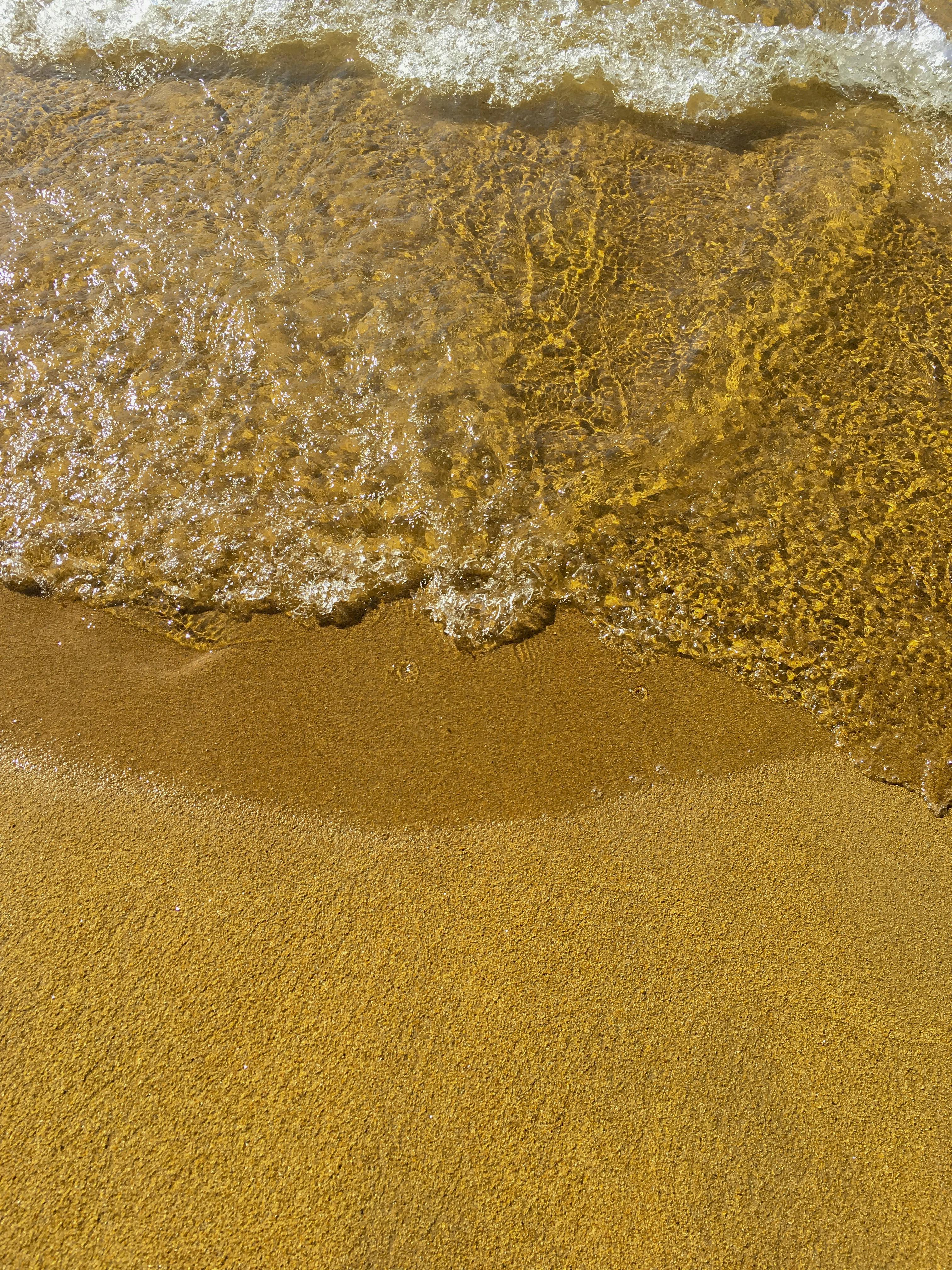 Newport Beach golden sandy beach with clear blue water