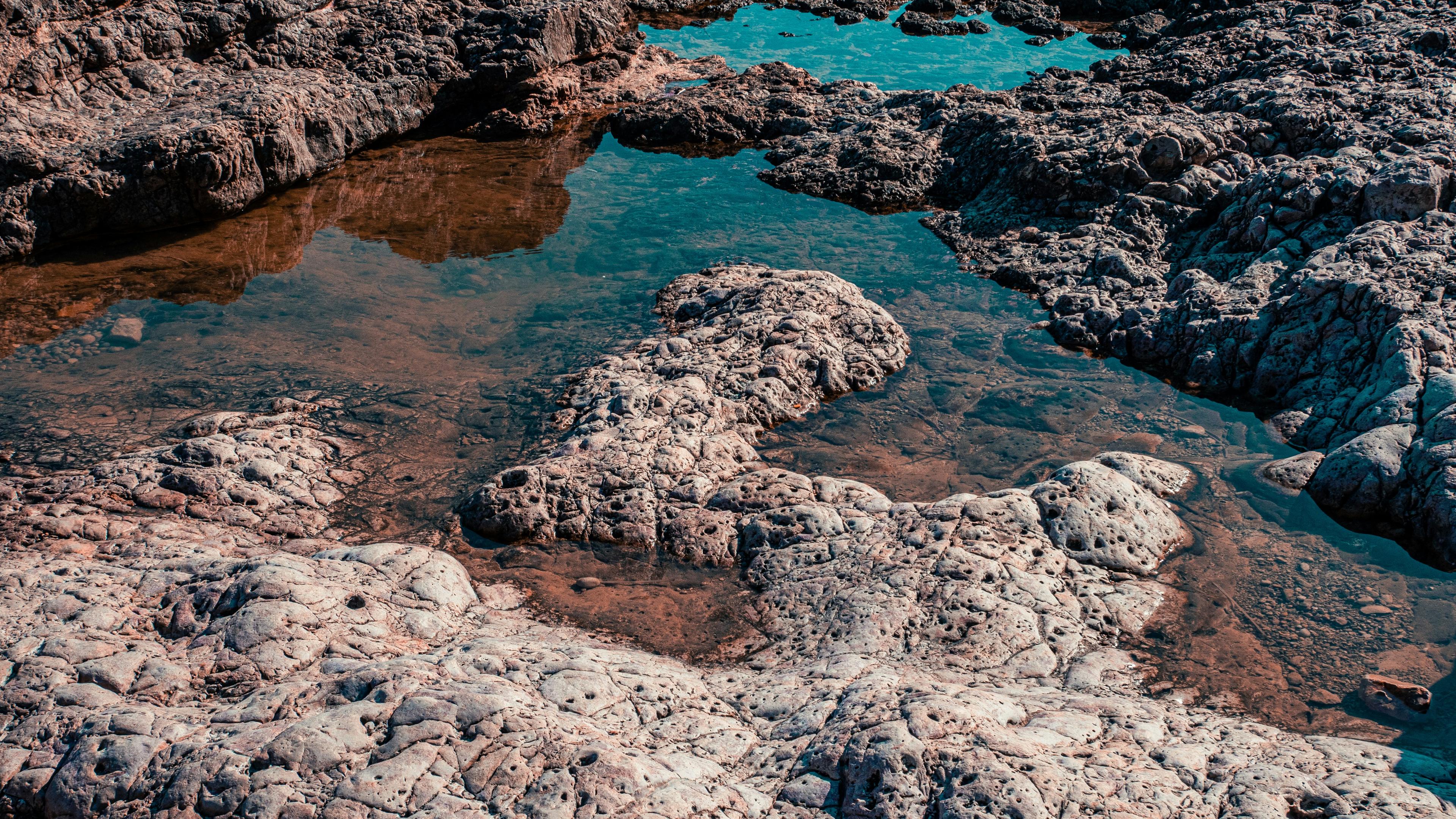 Corona del Mar State Beach with calm clear water and rocky tide pools