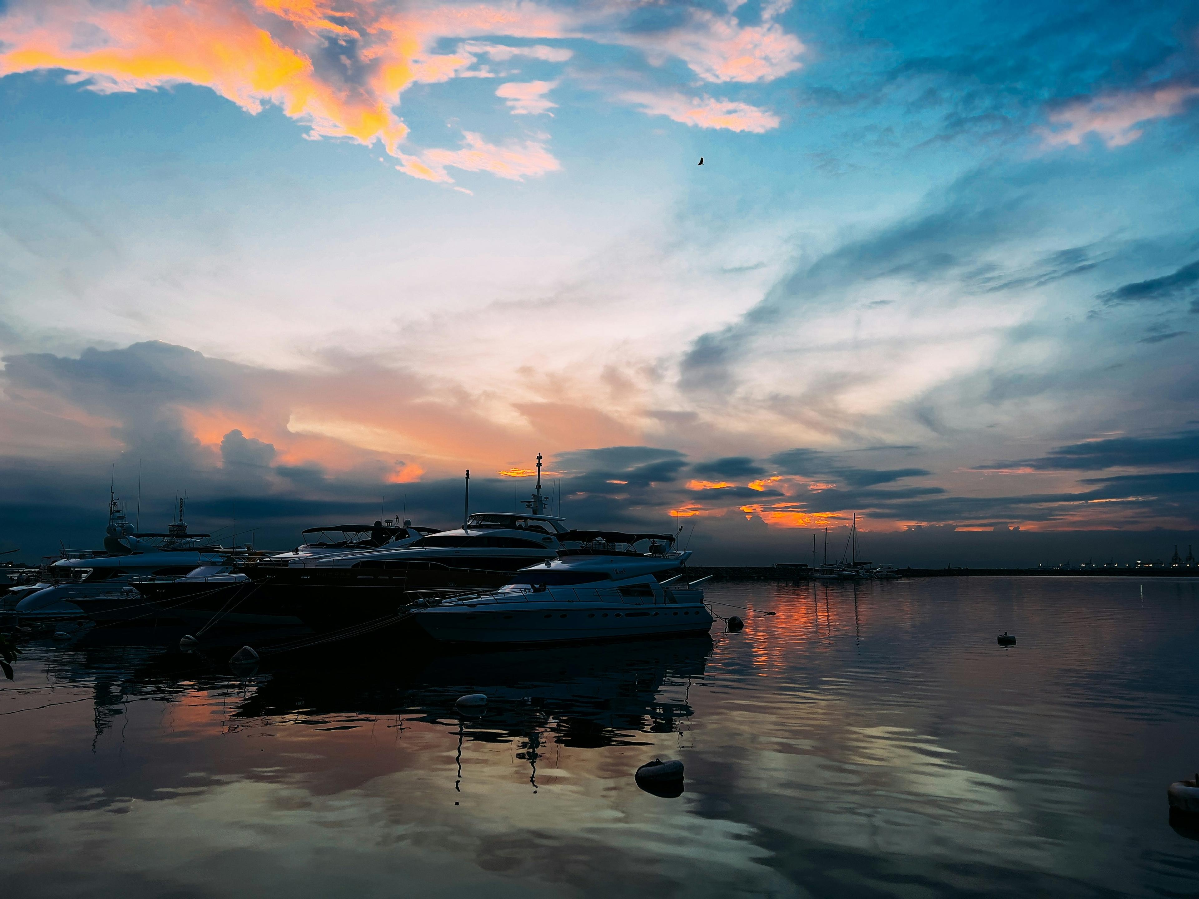 Luxury yacht in Newport Harbor at sunset