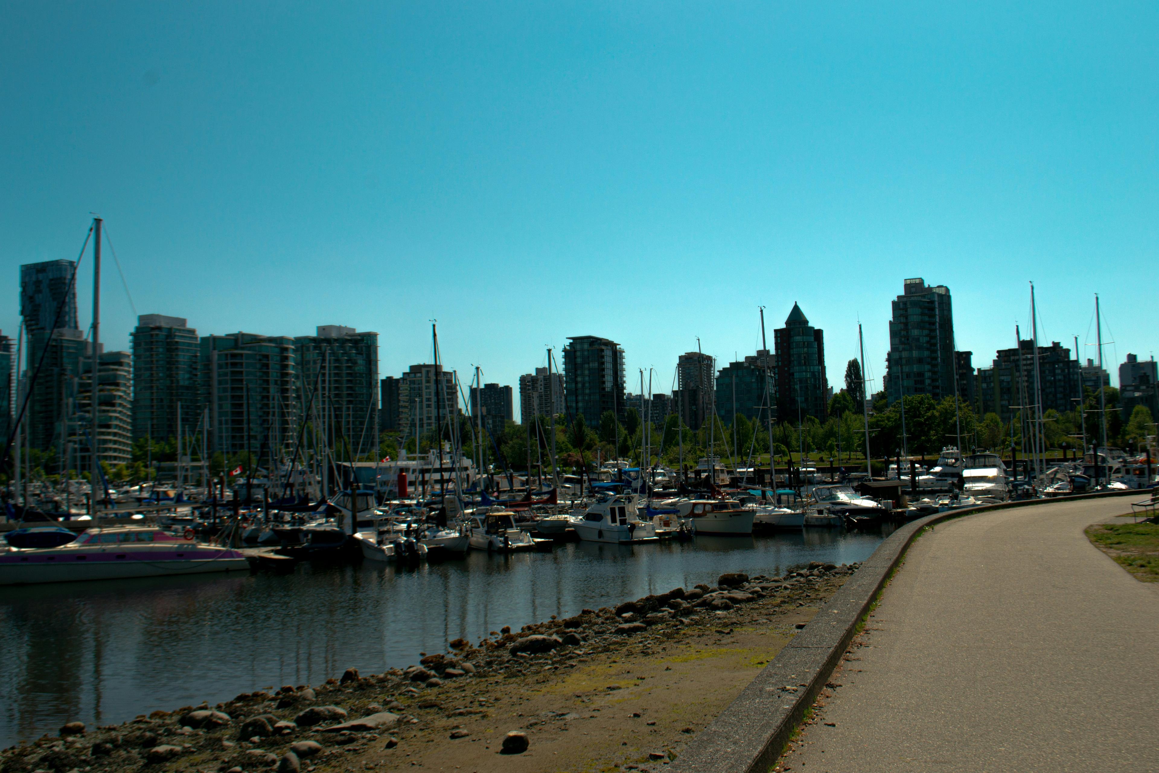 Newport Harbor with sailboats and yachts on a clear blue day