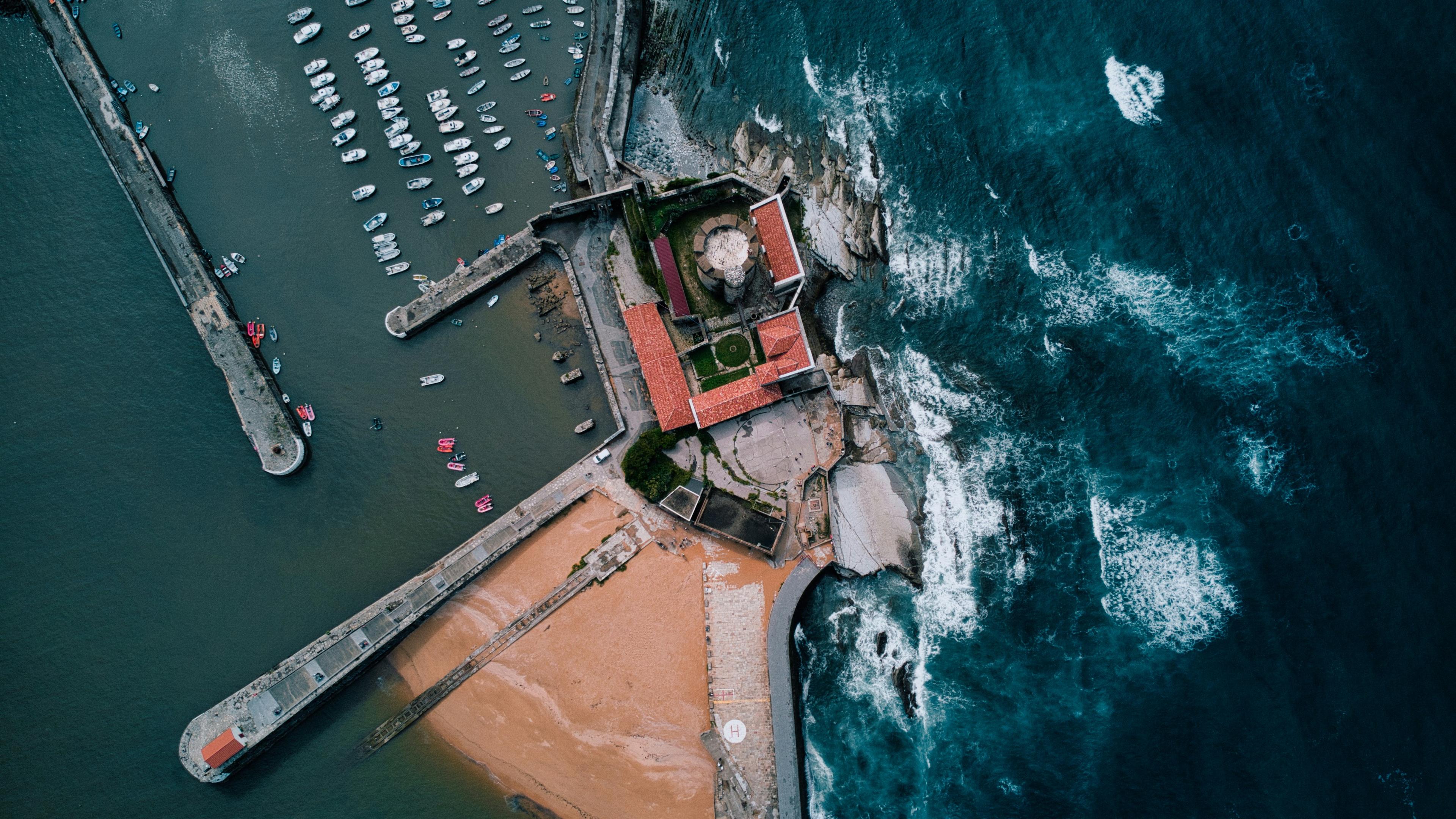 Newport Beach aerial view showing harbor, beaches, and neighborhoods