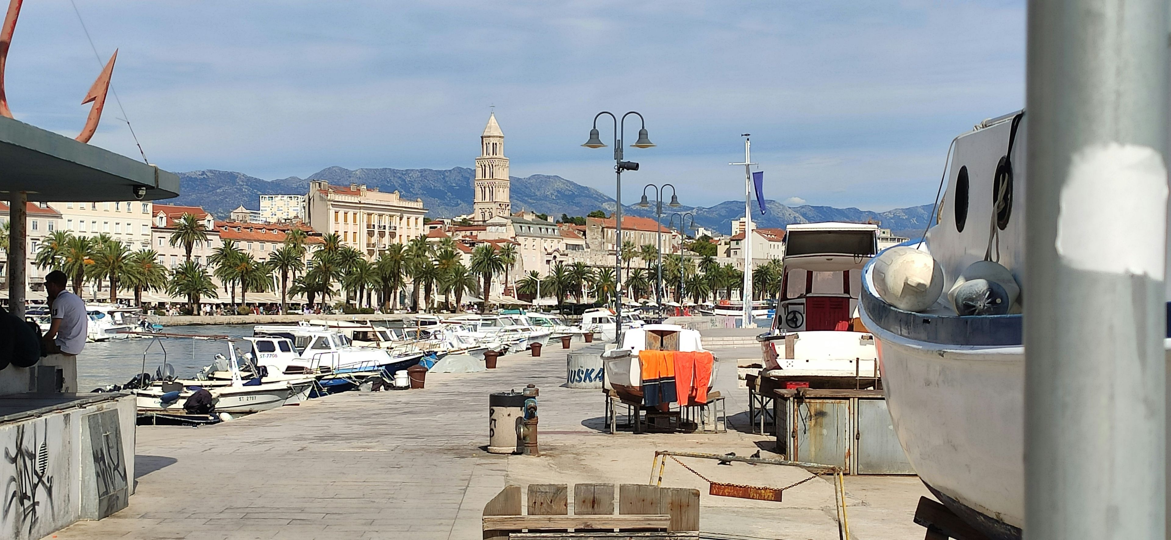 Catalina Island Avalon harbor with colorful boats and the iconic Casino building in the background on a clear day